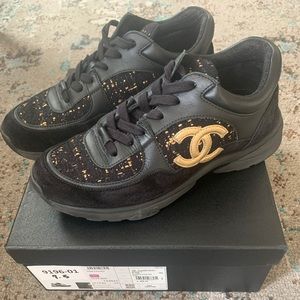 chanel sneakers black and gold